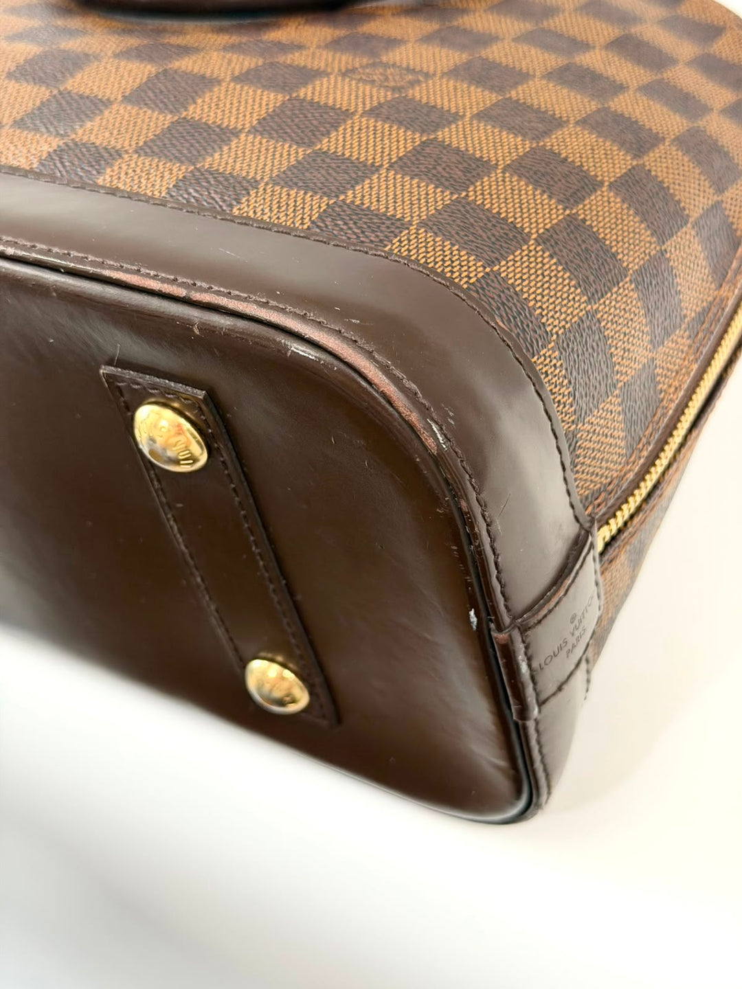 LOUIS VUITTON DAMIER EBENE ALMA PM HANDBAG