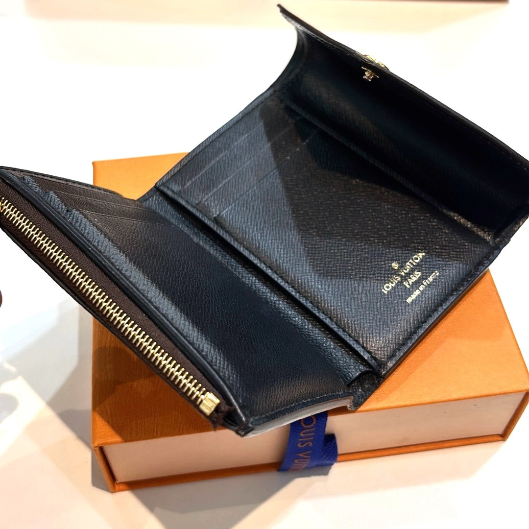 LOUIS VUITTON REVERSE MONOGRAM VICTORINE WALLET
