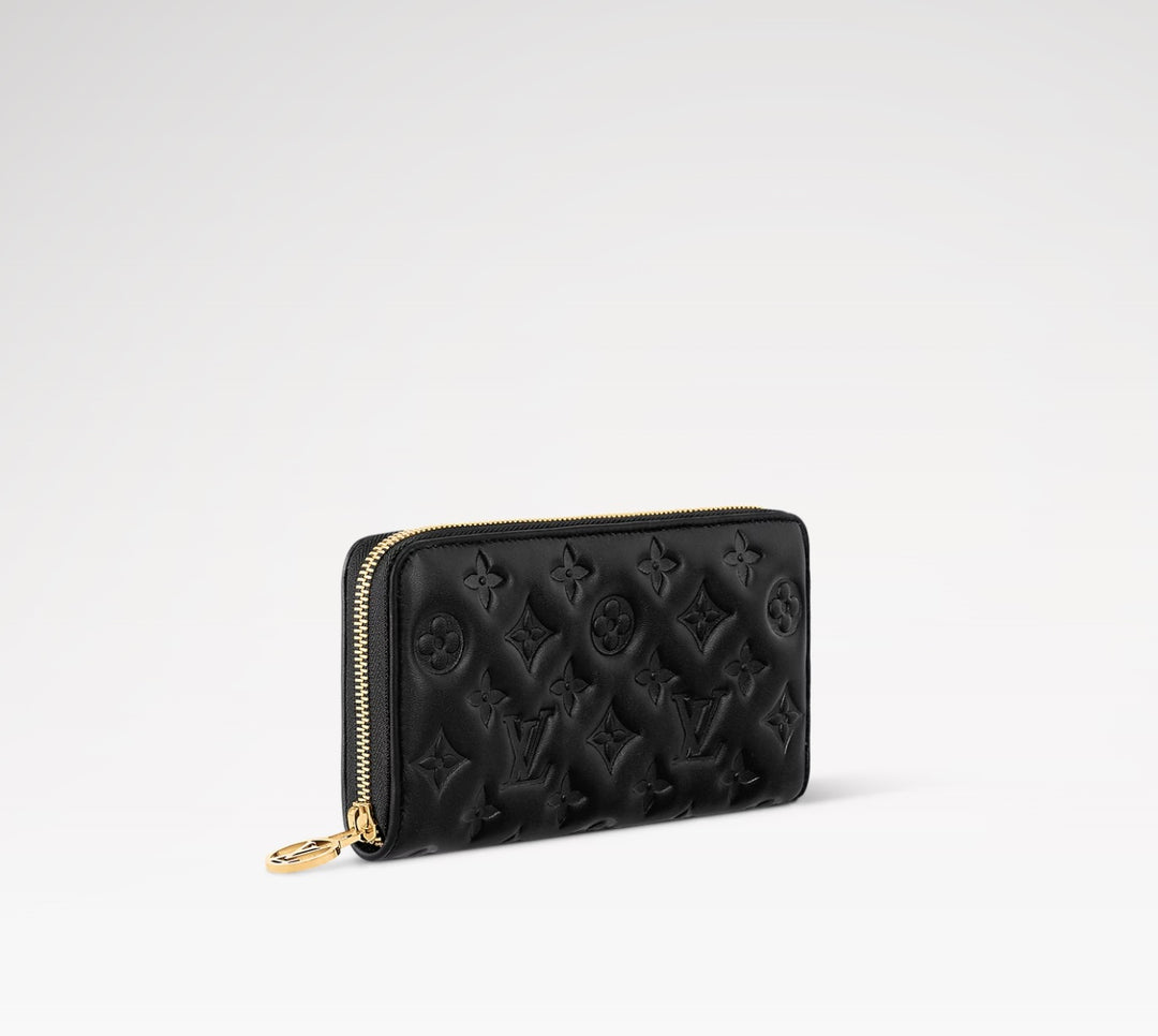 LOUIS VUITTON LAMBSKIN EMBOSSED MONOGRAM COUSSIN ZIPPY WALLET