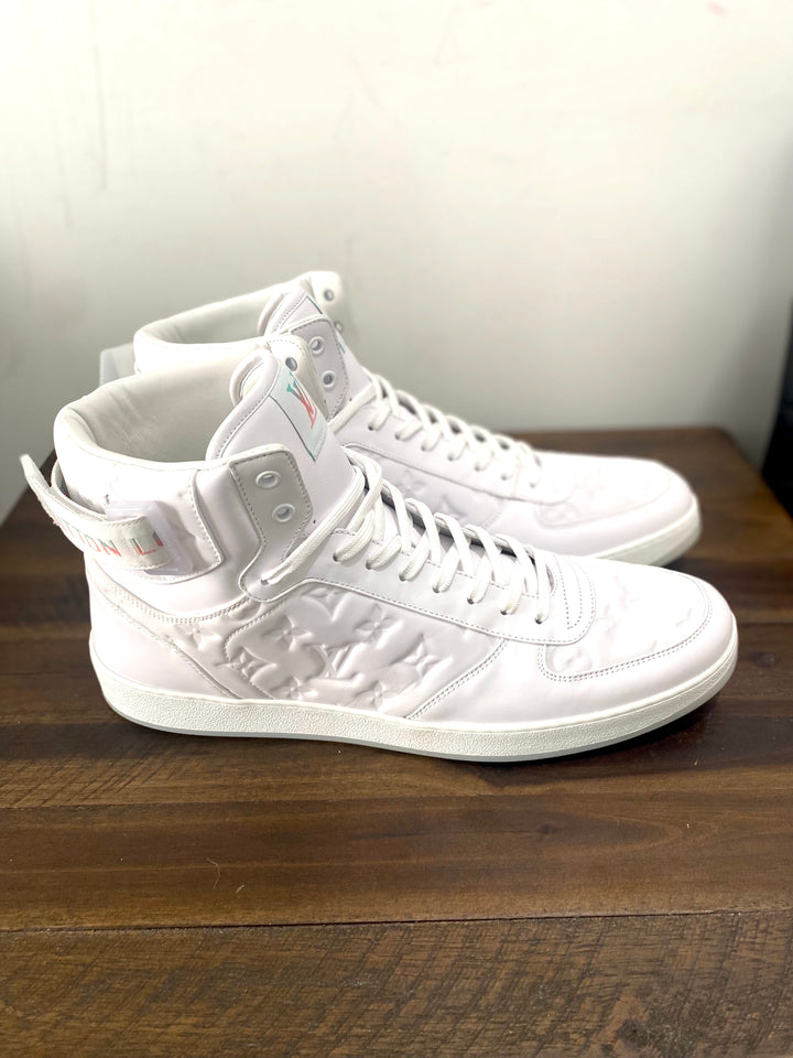 LOUIS VUITTON RIVOLI MONOGRAM LEATHER HI-TOP SNEAKERS – Caroline's