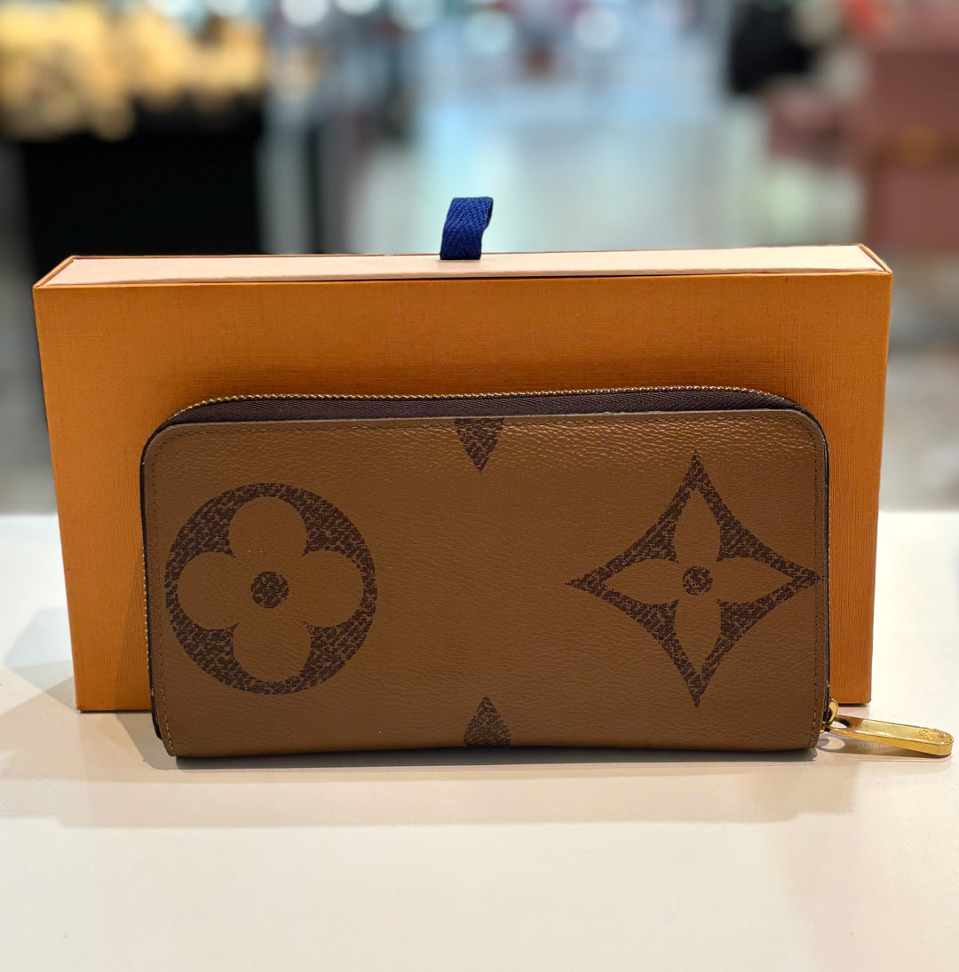LOUIS VUITTON REVERSE MONOGRAM GIANT ZIP AROUND WALLET