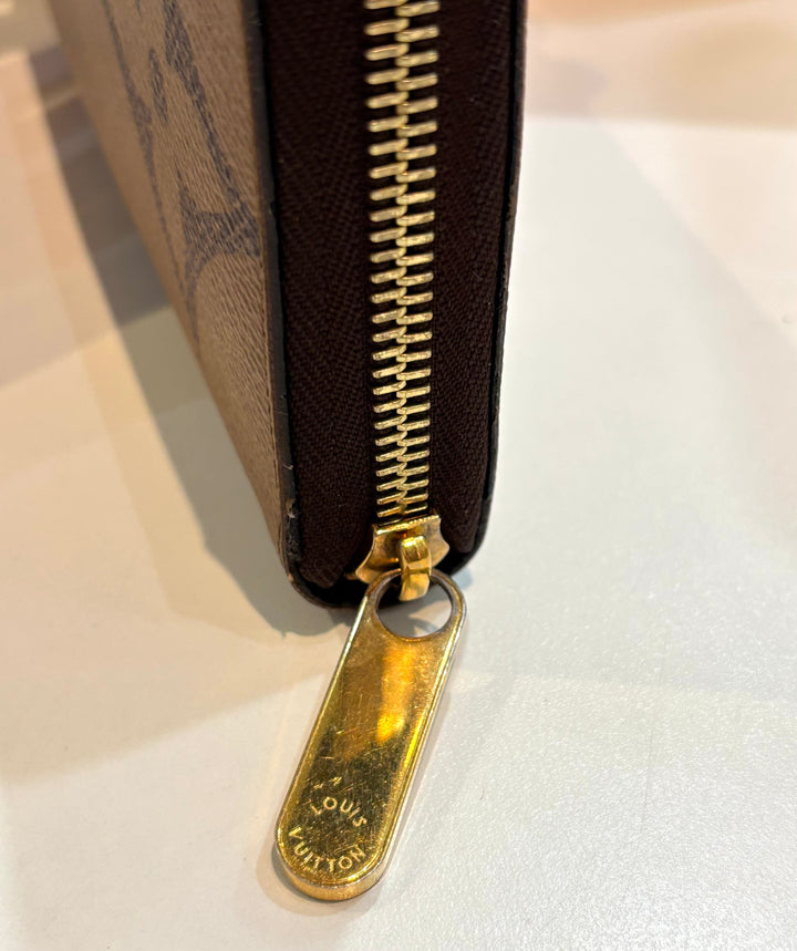 LOUIS VUITTON REVERSE MONOGRAM GIANT ZIP AROUND WALLET