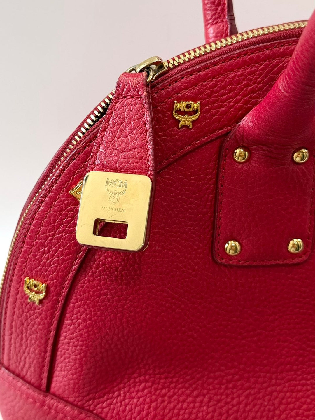 MCM STUDDED PEBBLED CALFSKIN LEATHER SATCHEL BAG
