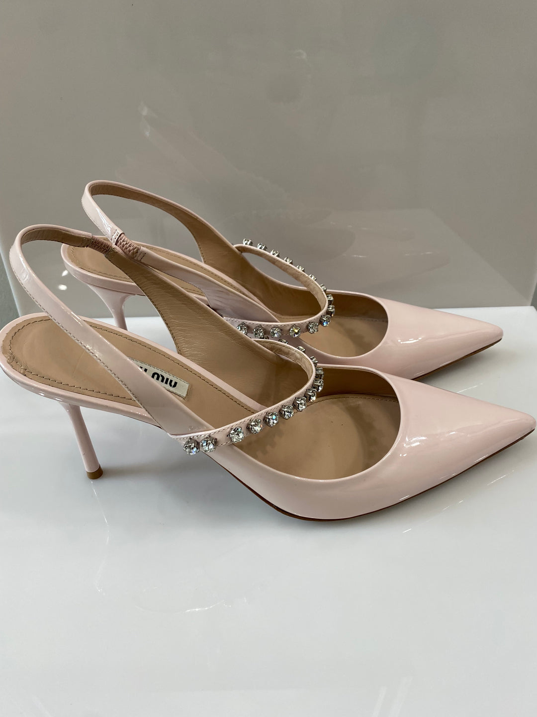 MIU MIU CRYSTAL EMBELLISHED SLINGBACK PUMPS
