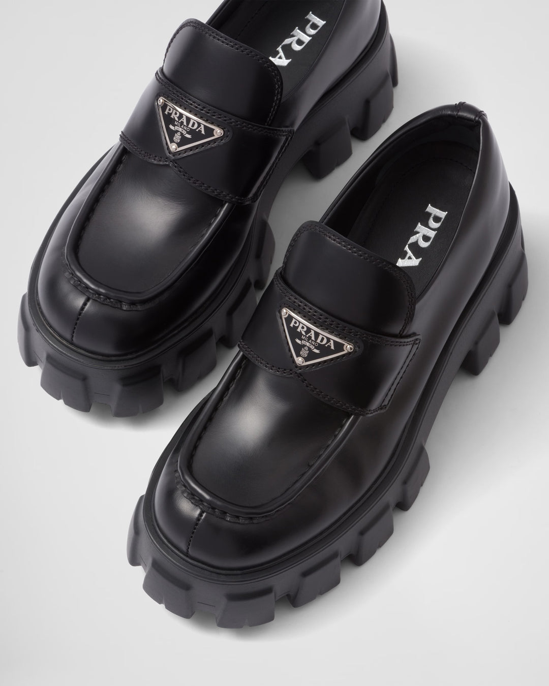 PRADA BRUSHED LEATHER MONOLITH LOAFERS