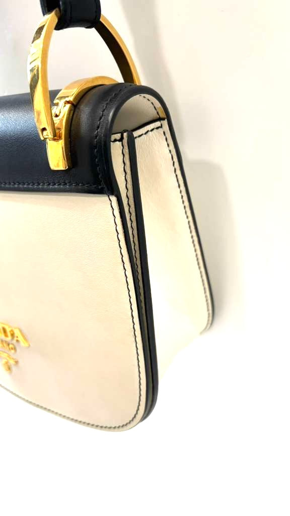 PRADA CITY LE SAC PRADA PIONNIÈRE CALFSKIN LEATHER SADDLE BAG