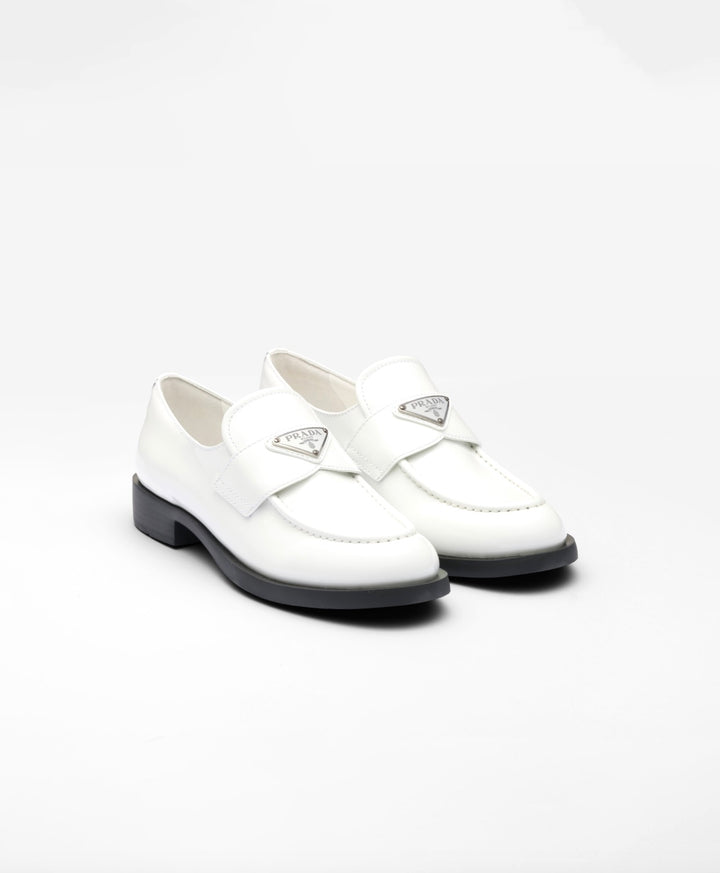 PRADA TRIANGLE LOGO PENNY SHINY BRUSHED CALFSKIN LEATHER LOAFERS
