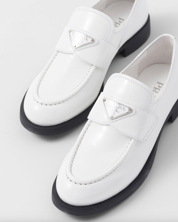 PRADA TRIANGLE LOGO PENNY SHINY BRUSHED CALFSKIN LEATHER LOAFERS