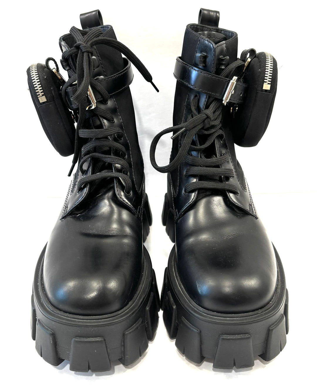 PRADA MONOLITH LEATHER COMBAT BOOTS WITH POUCH