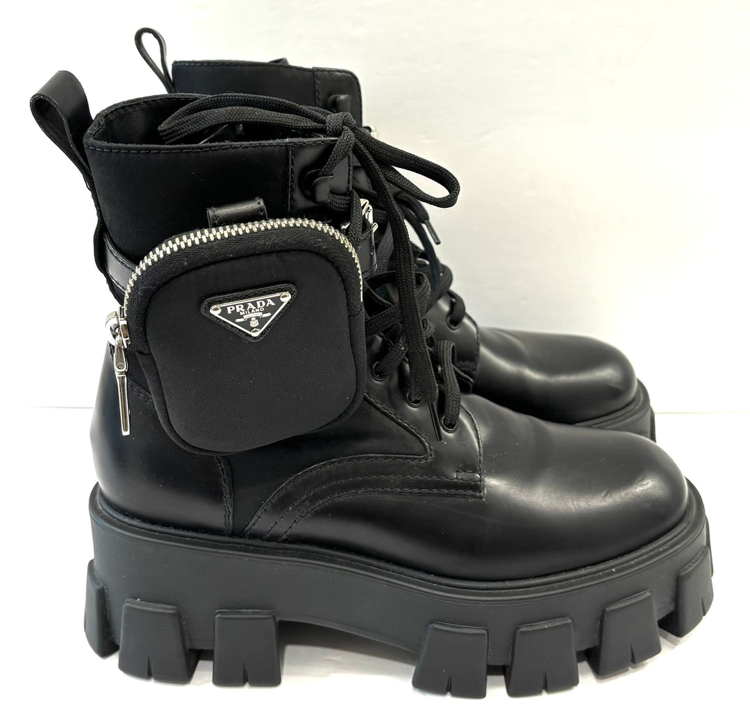 PRADA MONOLITH LEATHER COMBAT BOOTS WITH POUCH