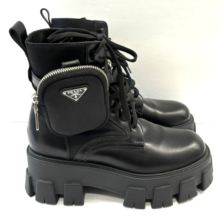PRADA MONOLITH LEATHER COMBAT BOOTS WITH POUCH