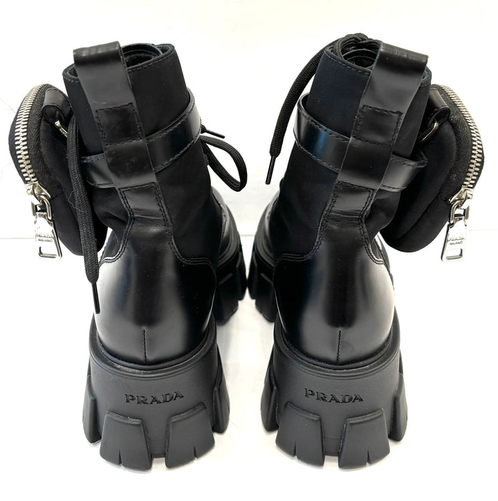 PRADA MONOLITH LEATHER COMBAT BOOTS WITH POUCH