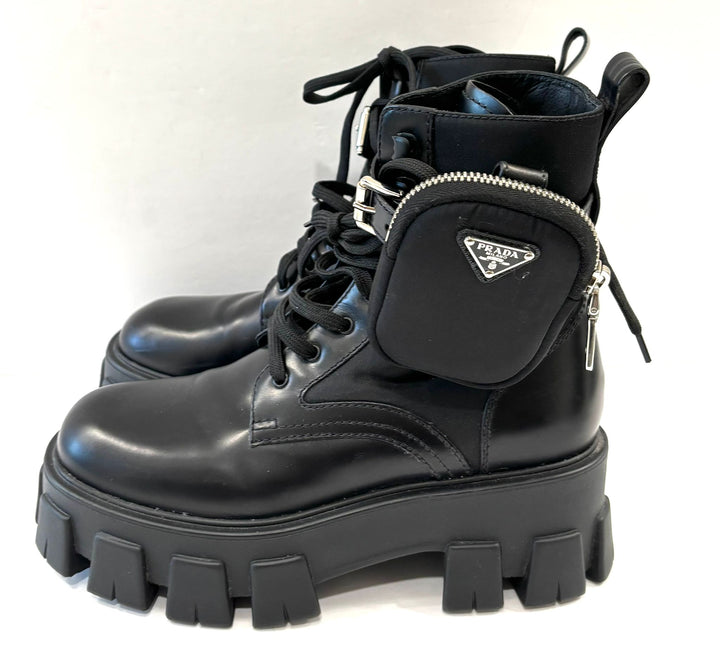 PRADA MONOLITH LEATHER COMBAT BOOTS WITH POUCH