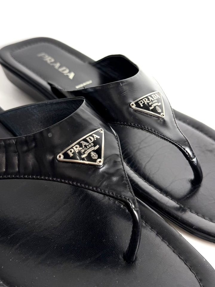 PRADA TRIANGLE LOGO PATENT LEATHER THONG SLIDE SANDALS