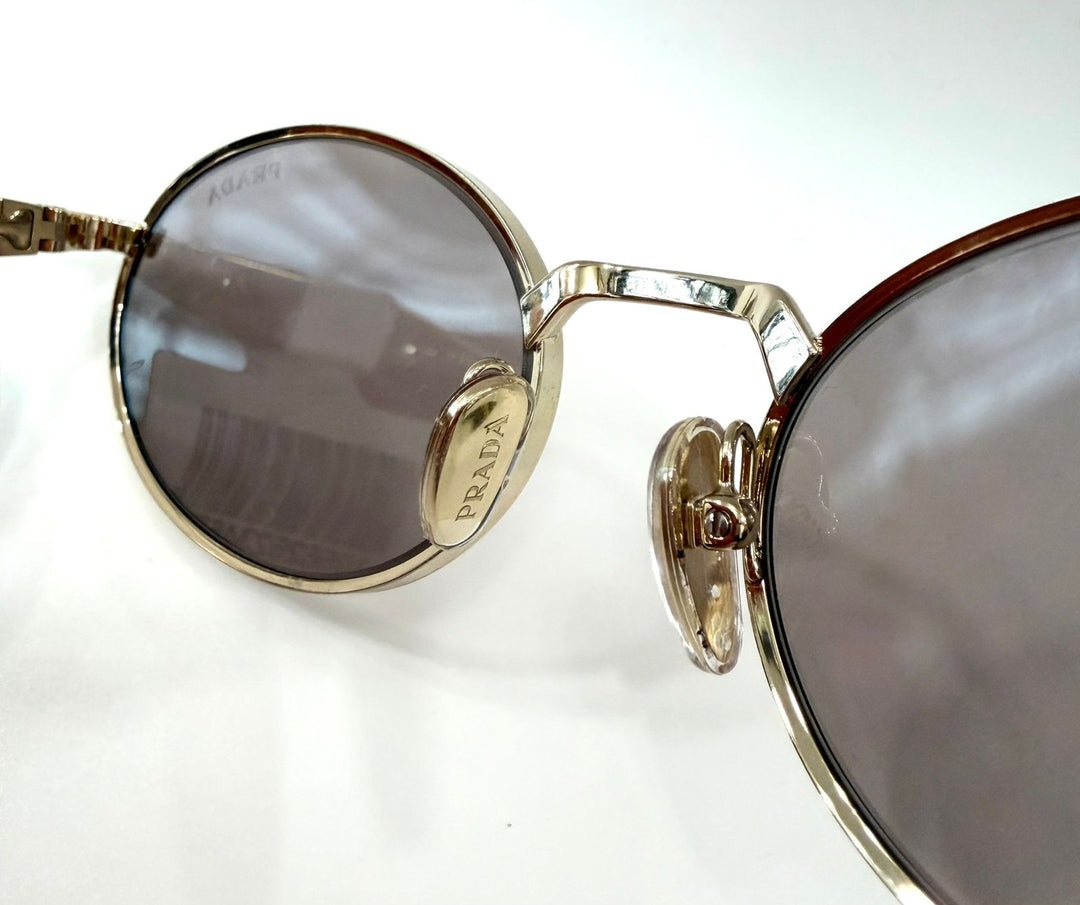 PRADA SPR65Z OVAL SUNGLASSES