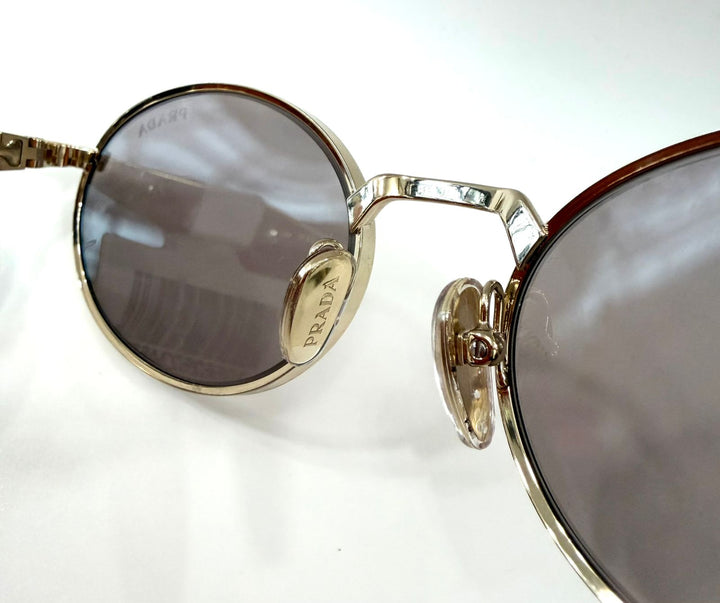 PRADA SPR65Z OVAL SUNGLASSES