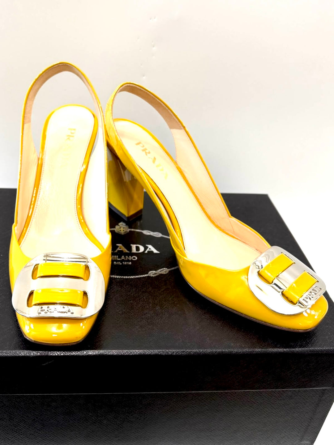 PRADA PATENT CALF LEATHER SLINGBACK PUMPS