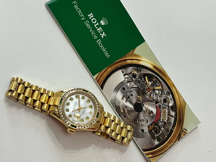 ROLEX PRESIDENTIAL 18K 28MM WITH CUSTOM AFTERMARKET DIAMOND AND EMERALD BEZEL MOP FACE