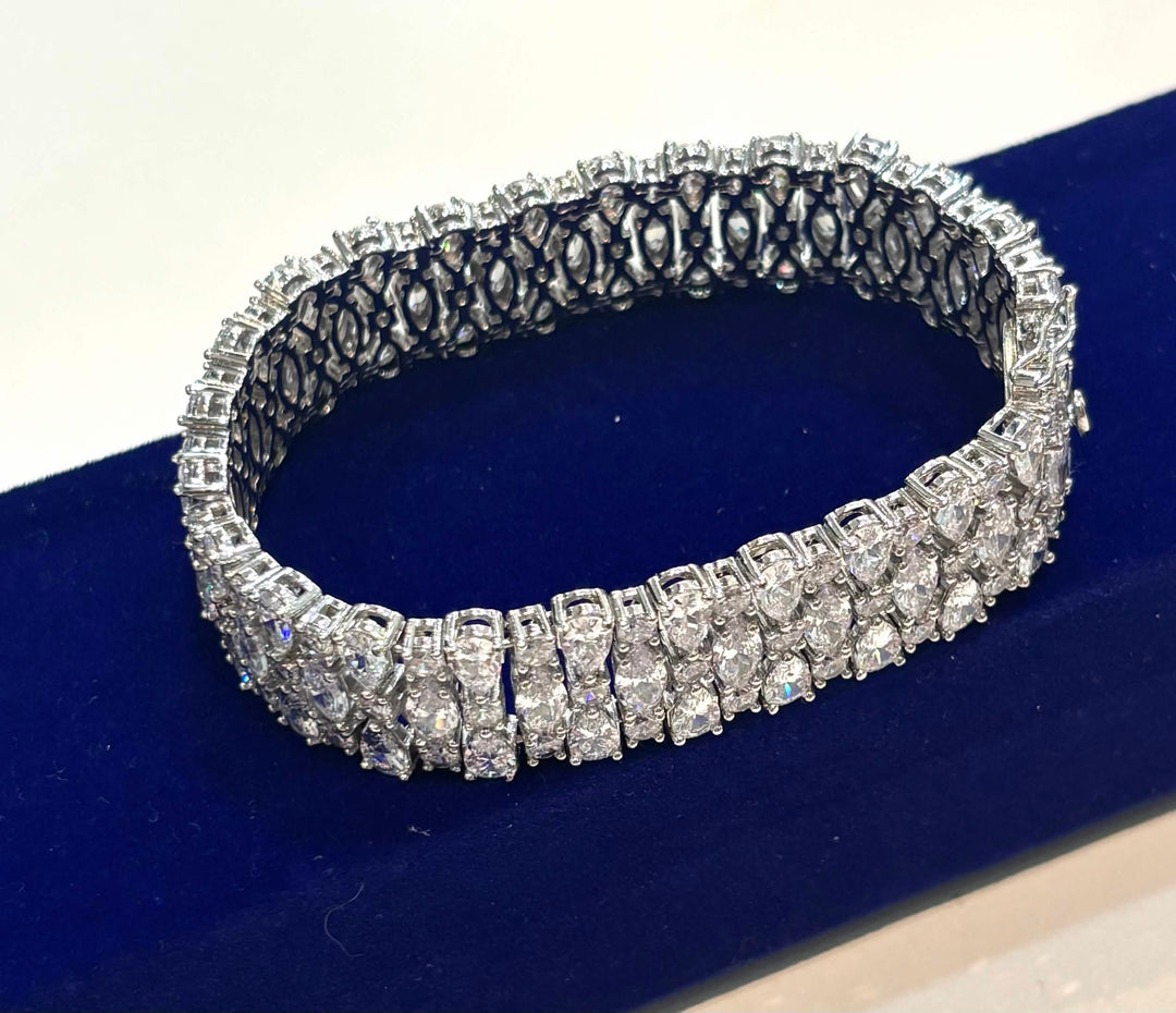 STERLING SILVER SWAROVSKI® CRYSTAL TRIPLE ROW TENNIS BRACELET