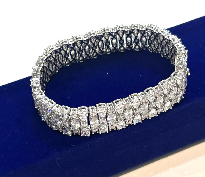 STERLING SILVER SWAROVSKI® CRYSTAL TRIPLE ROW TENNIS BRACELET