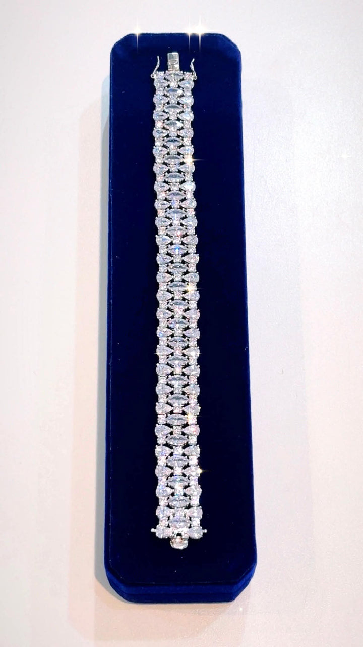 STERLING SILVER SWAROVSKI® CRYSTAL TRIPLE ROW TENNIS BRACELET