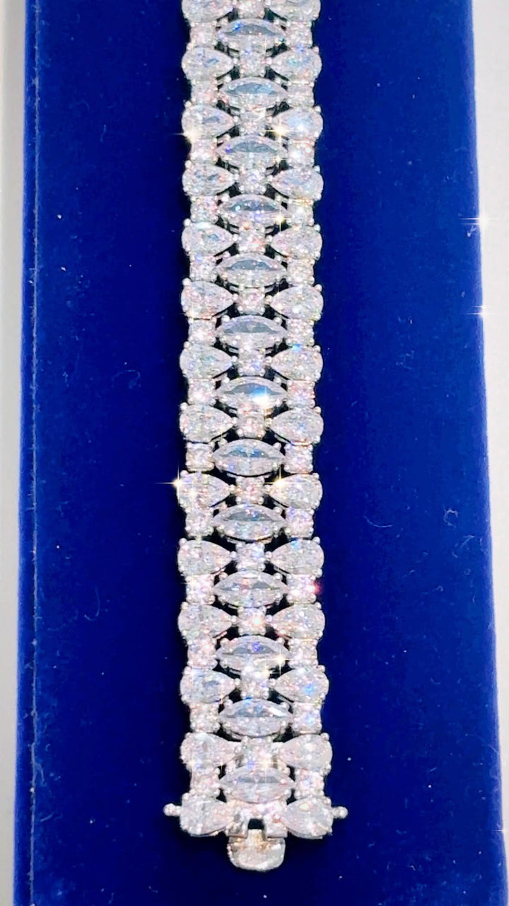 STERLING SILVER SWAROVSKI® CRYSTAL TRIPLE ROW TENNIS BRACELET