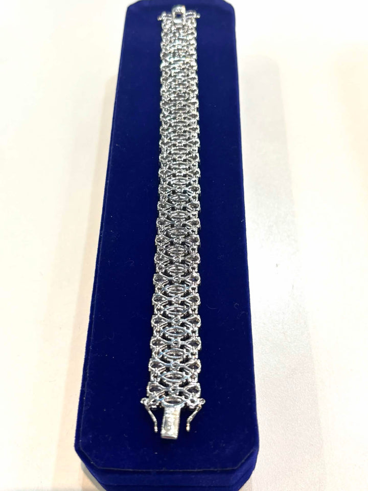 STERLING SILVER SWAROVSKI® CRYSTAL TRIPLE ROW TENNIS BRACELET