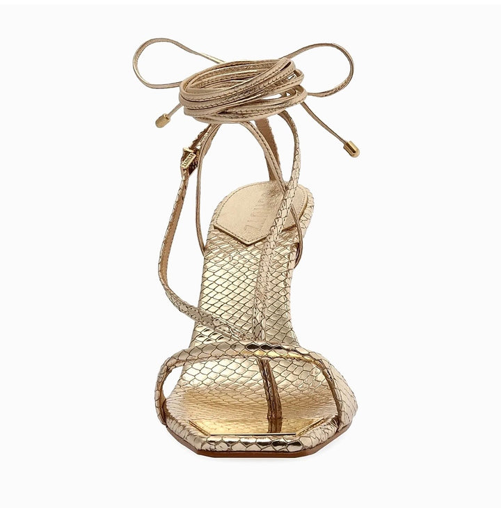 SCHUTZ VIKKI METALLIC SNAKE EMBOSSED LEATHER HEELED SANDALS