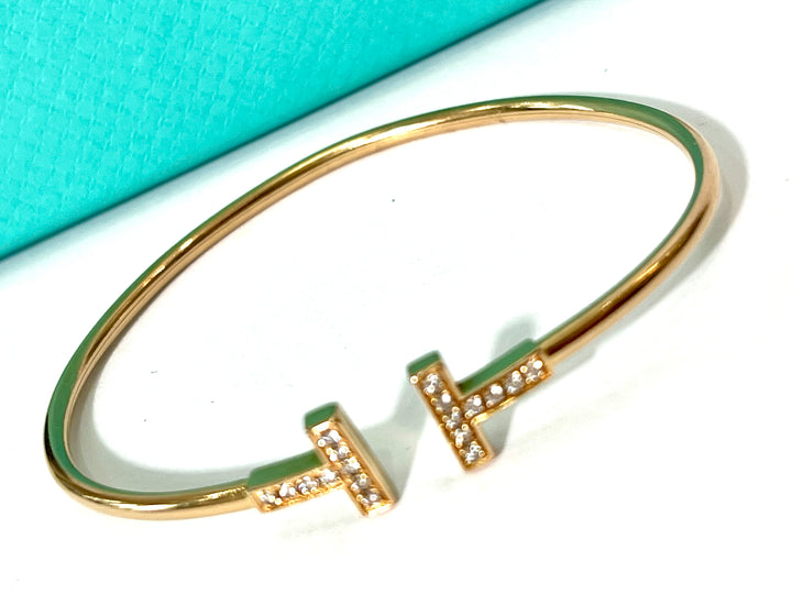TIFFANY &amp; CO. T-WIRE 18K YELLOW GOLD DIAMOND BRACLET