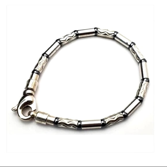 TIFFANY &amp; CO. HEMATITE &amp; AZTEC CARVED STERLING SILVER BRACELET