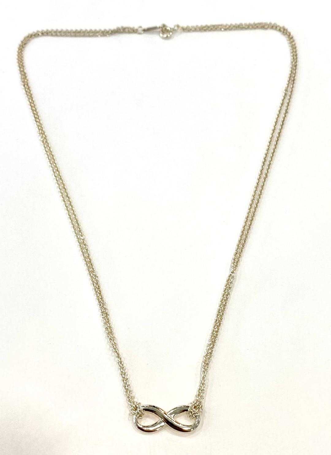 TIFFANY &amp; CO. STERLING SILVER INFINITY PENDANT NECKLACE