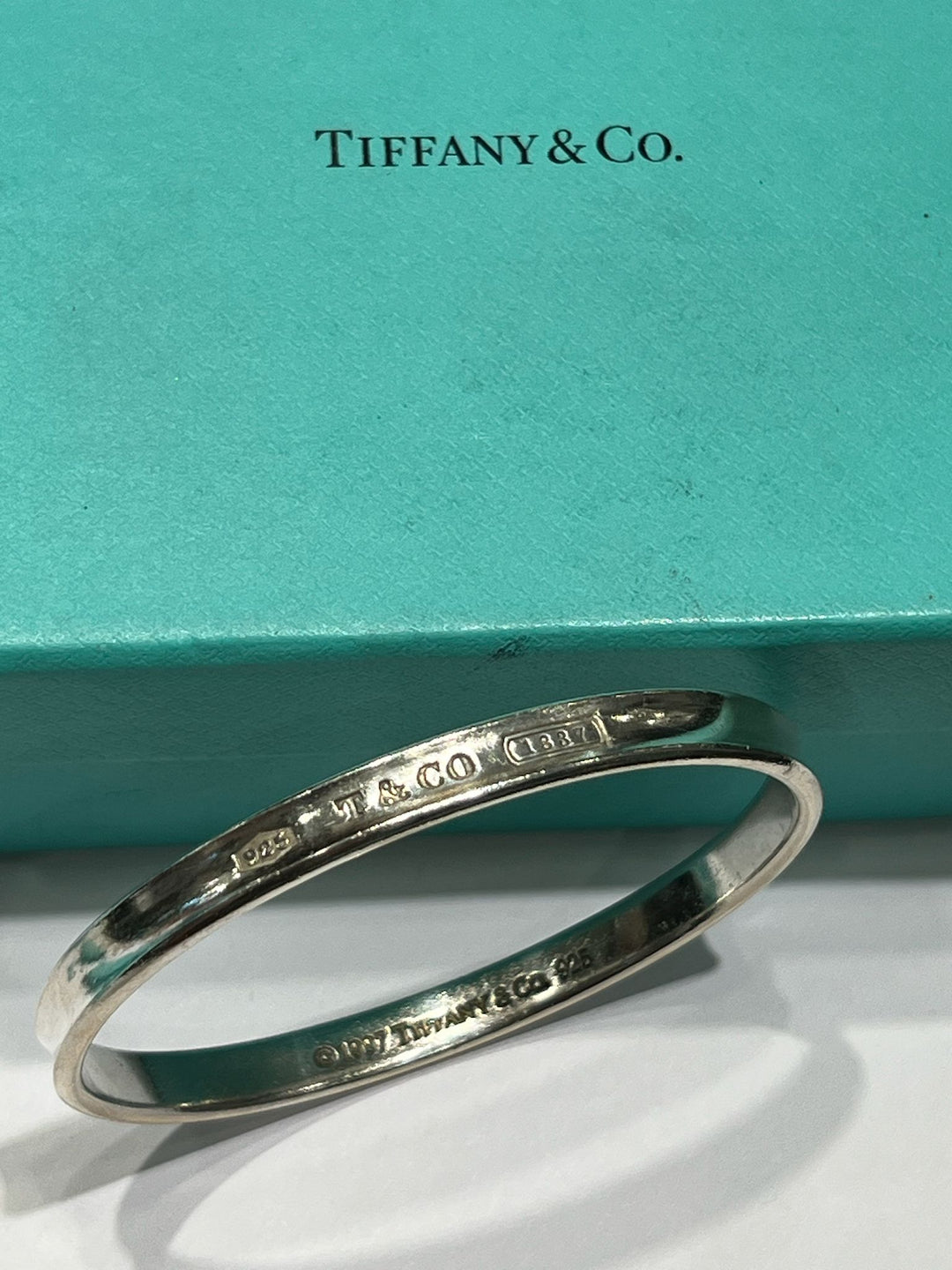 TIFFANY &amp; CO. STERLING SILVER BANGLE