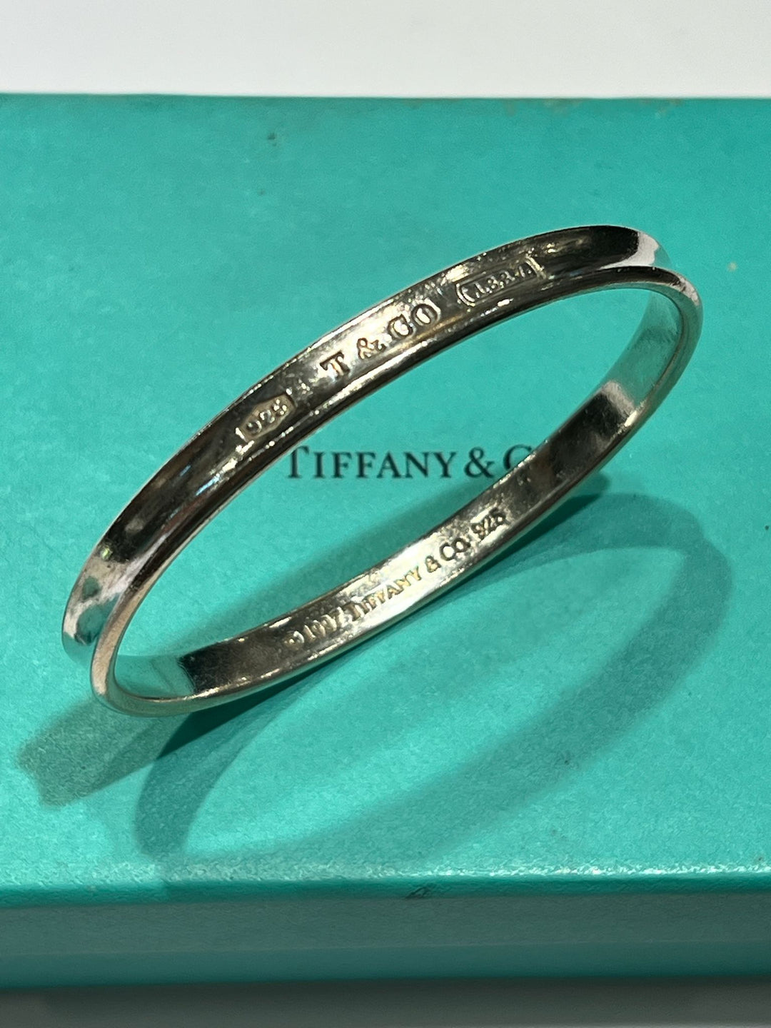 TIFFANY &amp; CO. STERLING SILVER BANGLE
