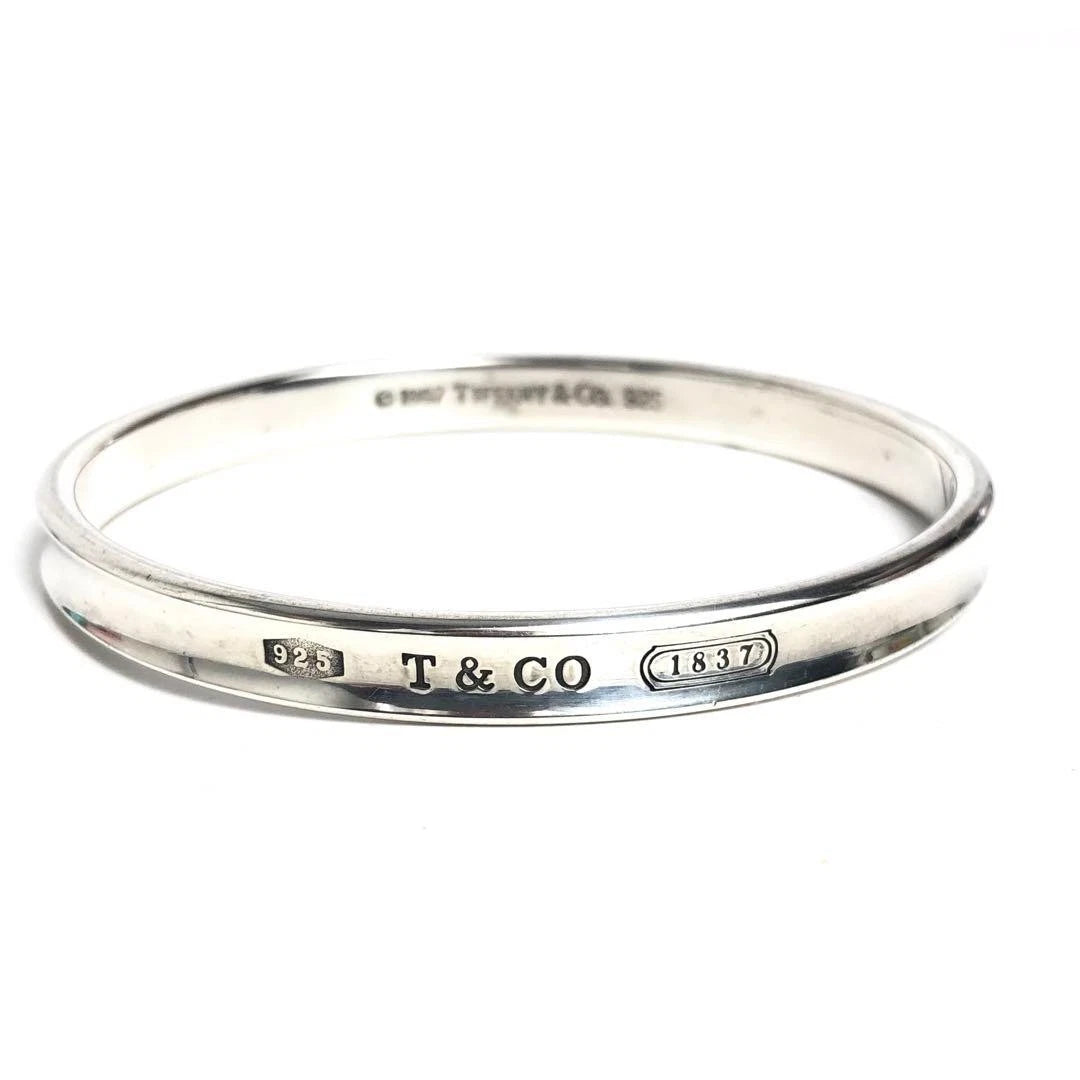 TIFFANY &amp; CO. STERLING SILVER BANGLE