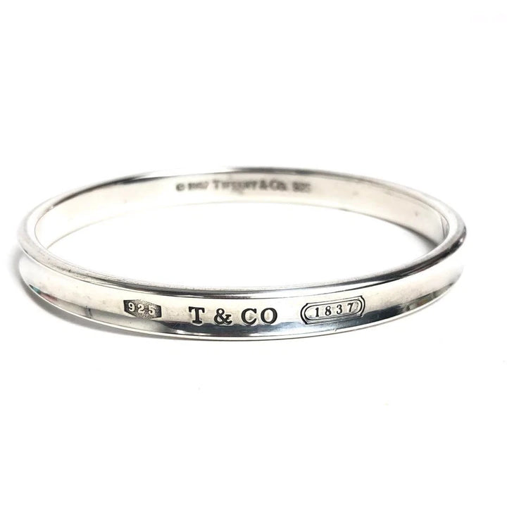 TIFFANY &amp; CO. STERLING SILVER BANGLE