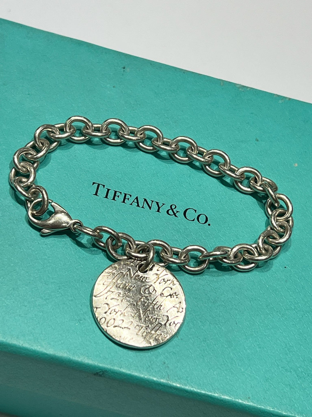 TIFFANY &amp; CO. NOTES CHARM BANGLE BRACELET
