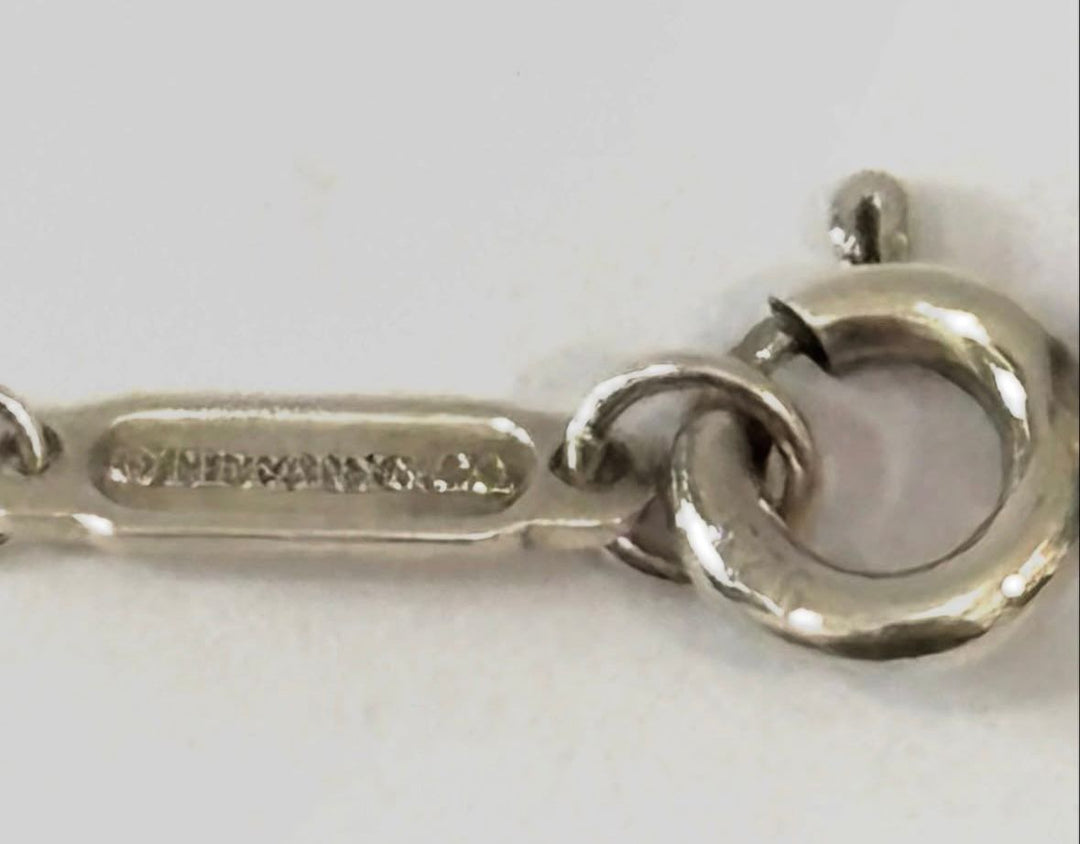 TIFFANY &amp; CO. STERLING SILVER KNOT PENDANT