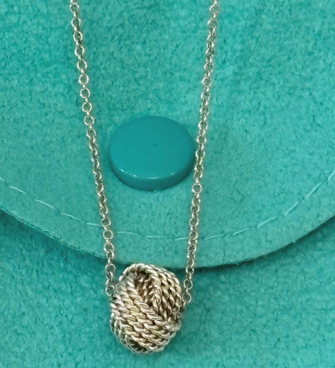 TIFFANY &amp; CO. STERLING SILVER KNOT PENDANT