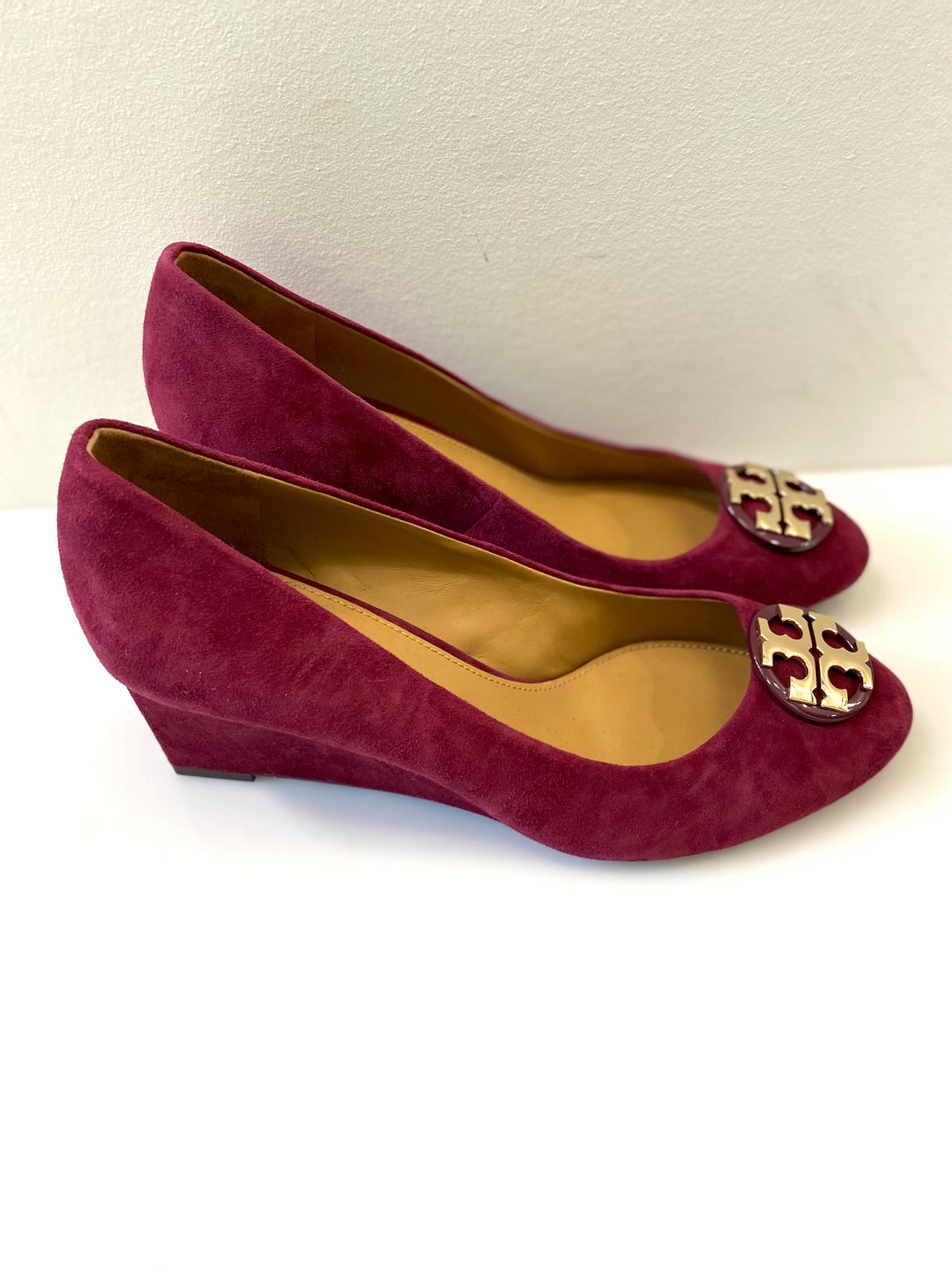 TORY BURCH LUNA EMBELLISHED SUEDE MEDALLION WEDGE HEEL PUMPS