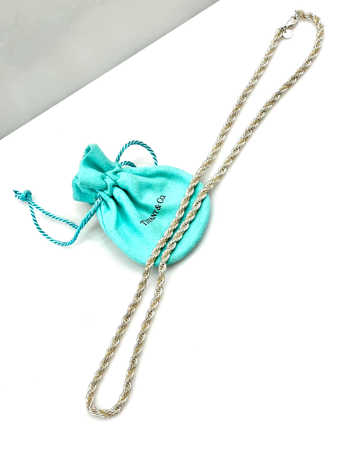TIFFANY & CO. STERLING SILVER AND 18K GOLD TWIST CHAIN 24