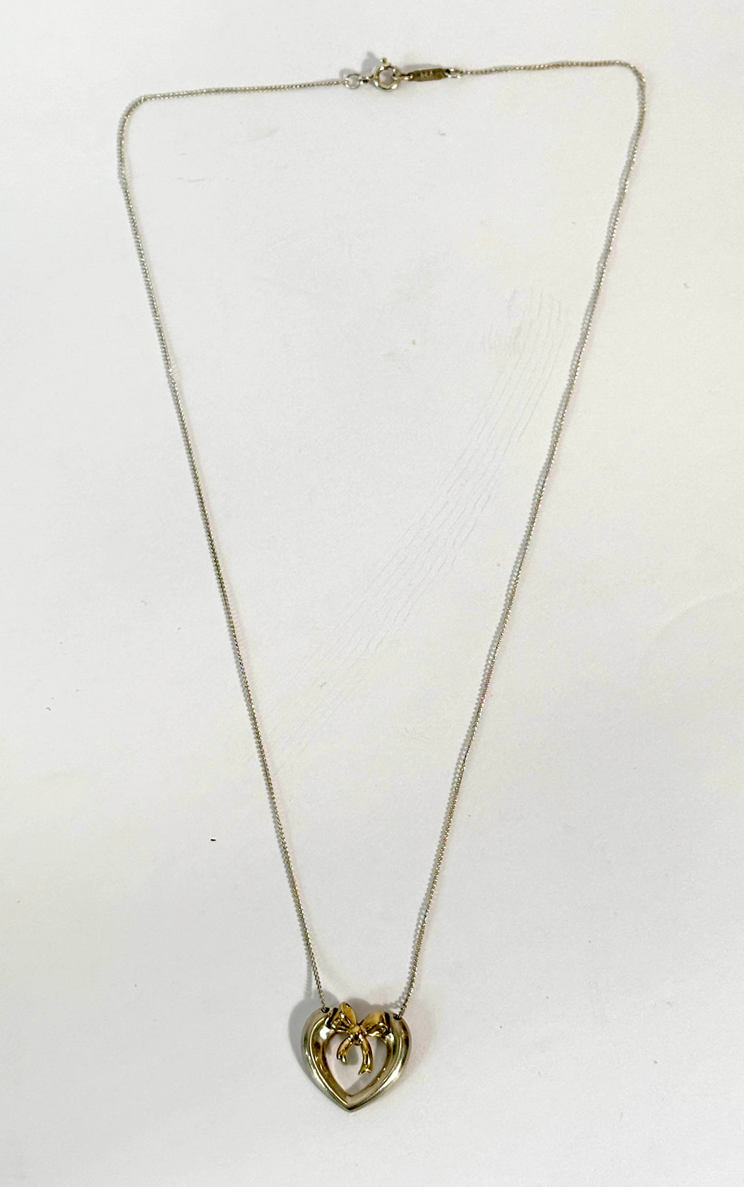 TIFFANY &amp; CO. STERLING SILVER 18K YELLOW GOLD HEART RIBBON NECKLACE