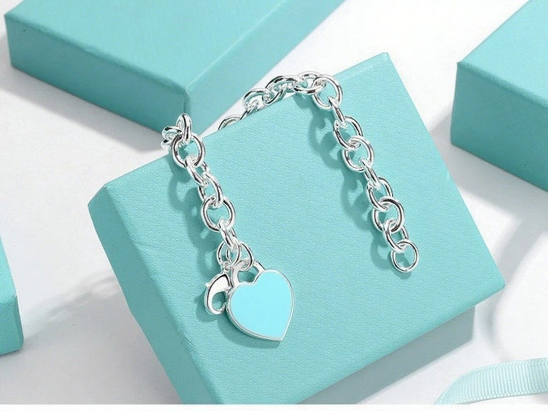TIFFANY STERLING SILVER BLUE ENAMEL RTT HEART CHARM BRACELET