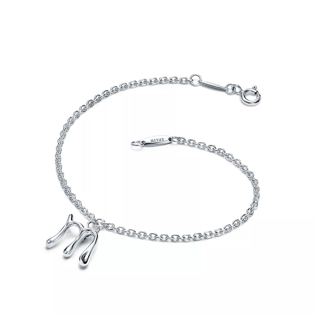 TIFFANY &amp; CO. ELSA PERETTI® STERLING SILVER "M" ALPHABET PENDANT BRACELET