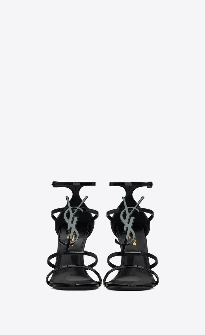 YSL CASSANDRA LOGO EMBELLISHED PATENT LEATHER SANDALS