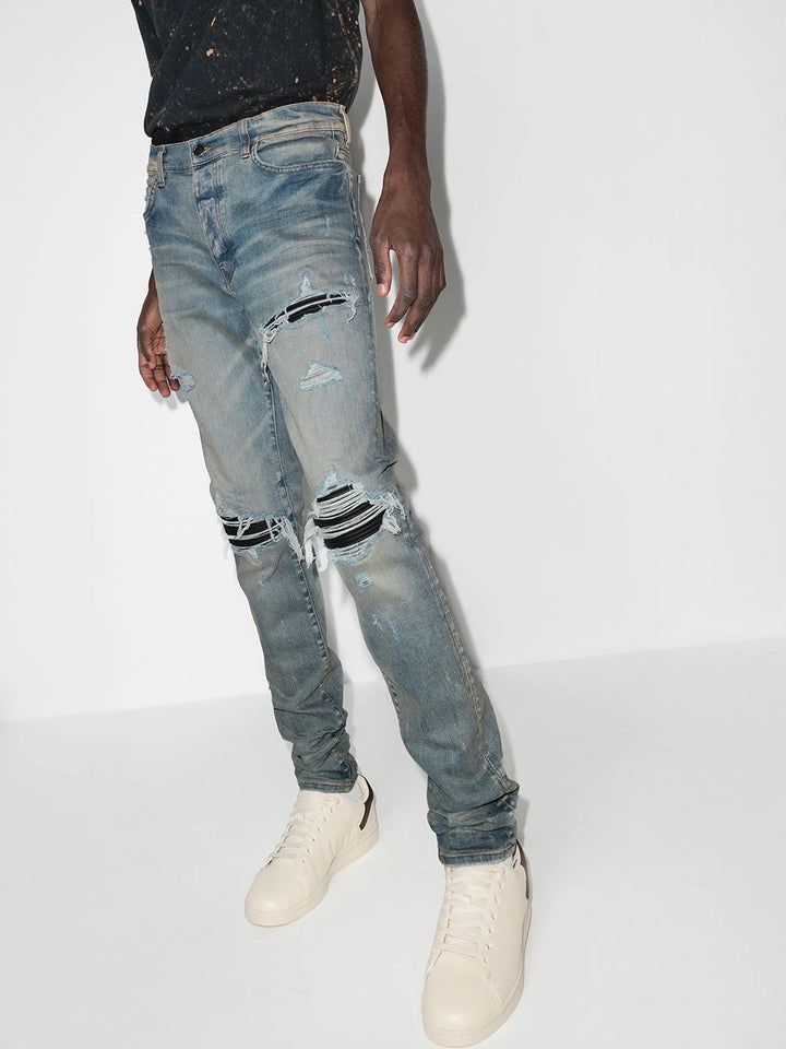 AMIRI MX1 DISTRESSED EFFECT SKINNY JEANS
