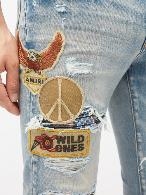 AMIRI BIKER PATCH DISTRESSED SKINNY JEANS – Caroline's Fashion Luxuries