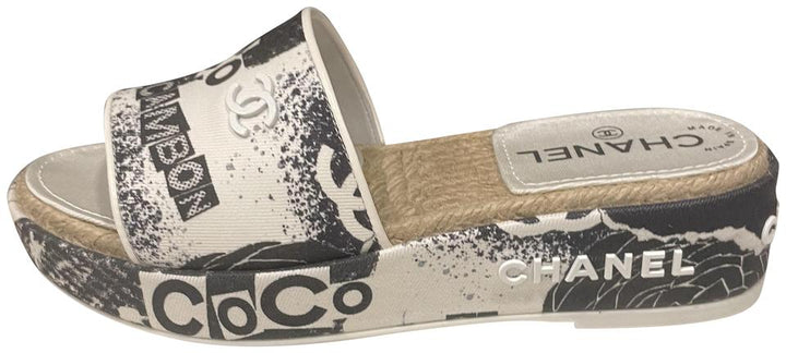 CHANEL COCO SIGNATURE PRINTED PLATFORM MULE SLIDES