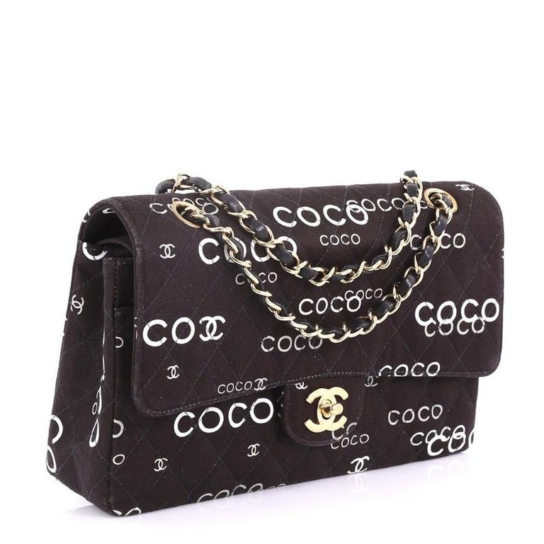 Chanel Pre-owned 2002 Coco-Print Double Flap Shoulder Bag - Black