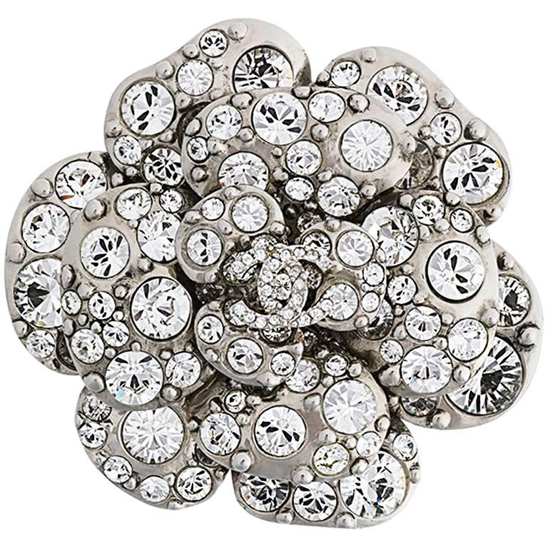 CHANEL Swarovski Crystal Camellia CC Brooch Silver – Caroline's Fashion  Luxuries