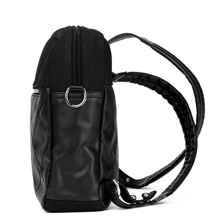 CHANEL PARIS BIARRITZ CC QUILTED COATED CANVAS BACKPACK